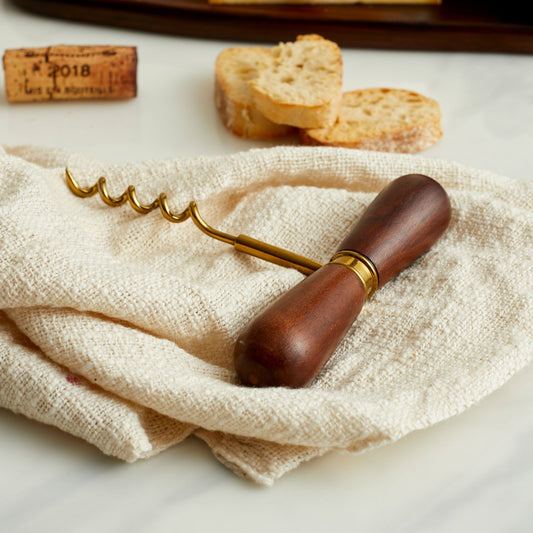 Discover The Thistle Cellar Key—an acacia and steel corkscrew for soulful hosting, twilight pours, and heritage-inspired bar rituals. A timeless gift.