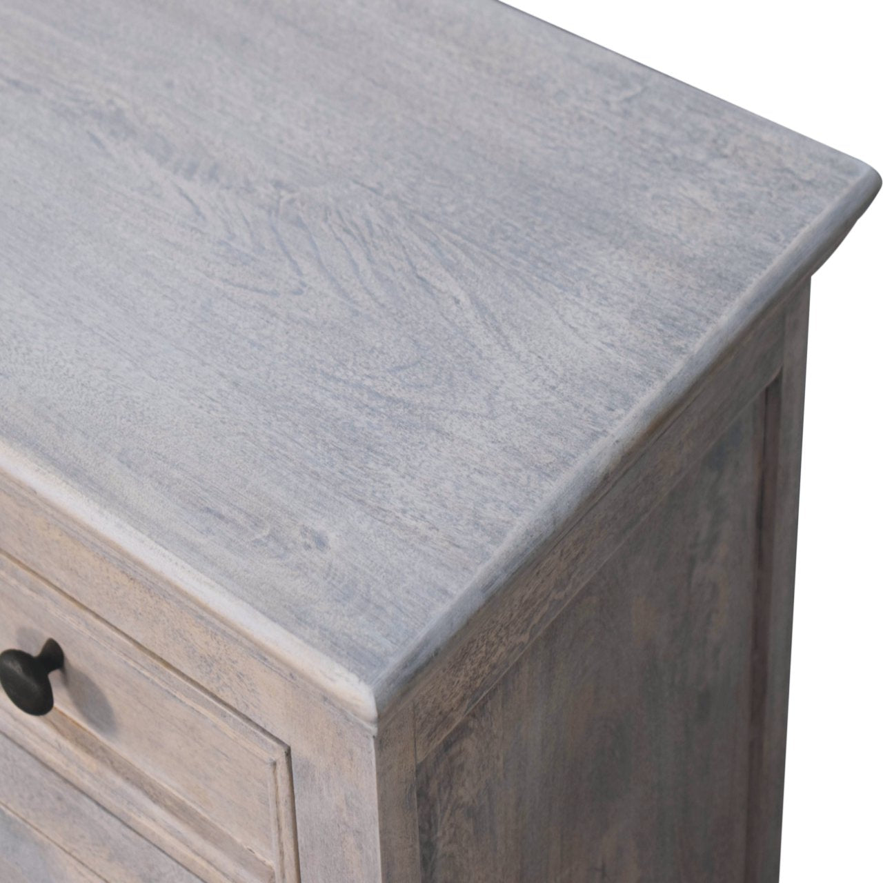 Close-up of The Alnwick Glazier’s Cabinet — showing stone finish wood grain and top edge detailing, crafted for timeless interiors and soulful refinement.