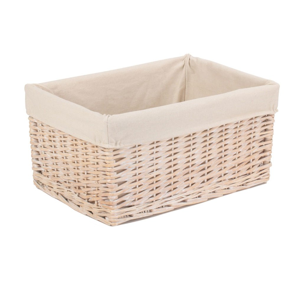 Edith Whitewash Keeper – single square whitewashed willow storage basket with removable white cotton lining, shown angled to reveal depth, handwoven texture, and soft interior.