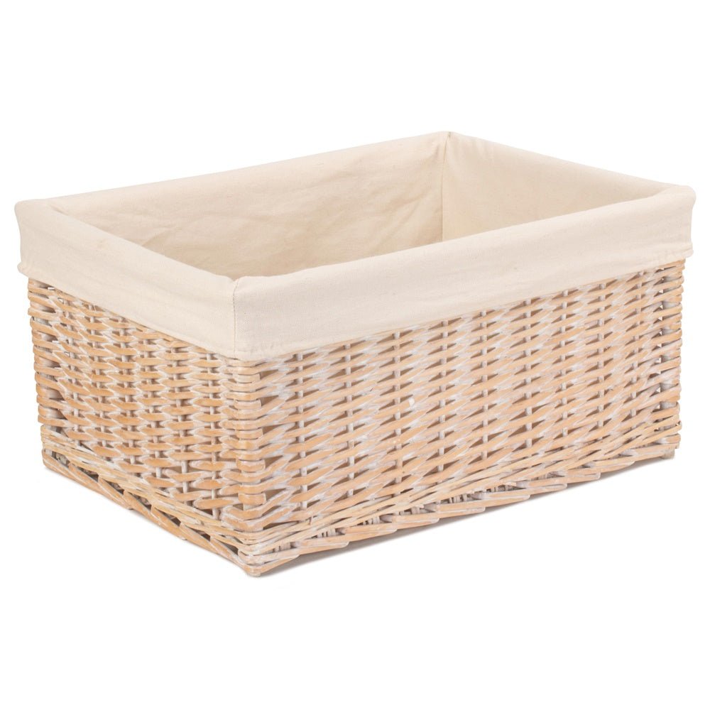 Edith Whitewash Keeper – single square whitewashed willow storage basket with removable white cotton lining, shown angled to highlight handwoven texture and soft interior.