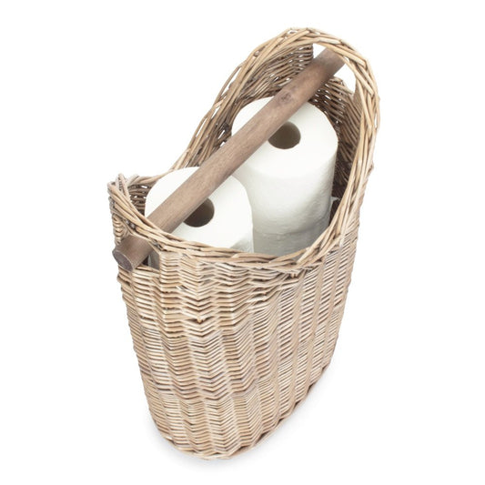The Aldwych Loo Stand – round handwoven wicker toilet roll holder with antique wash finish, shown holding three toilet rolls in a bathroom setting to highlight its spacious interior, natural weave, and timeless utility.