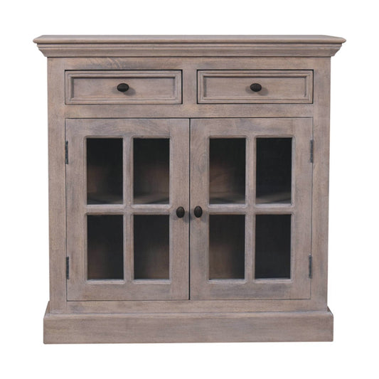 The Alnwick Glazier’s Cabinet — stone finish wood cabinet with glazed upper doors, drawers, and lower cupboards, styled for timeless interiors and soulful storage.