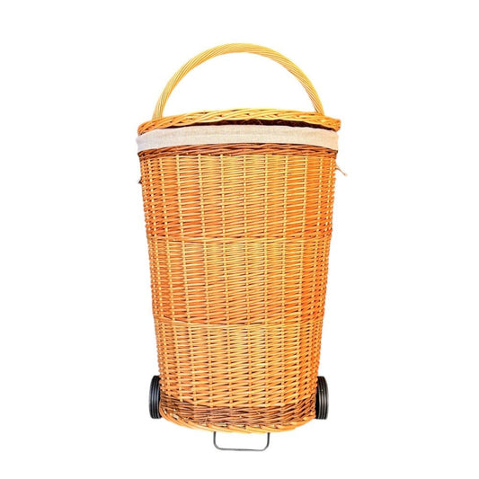 The Malbury Market Trolley — handwoven full buff willow shopping basket with curved handle and wheels, styled for timeless errands and rustic home storage.