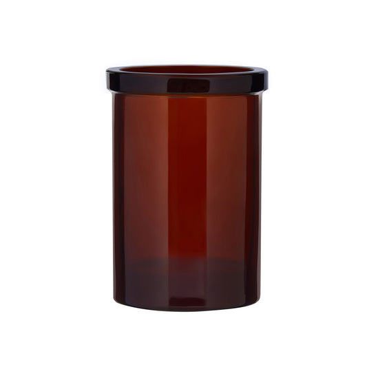 The Wetherby Amber Glass Toothbrush Holder – vintage-style bathroom cup in translucent amber glass, styled beside a basin for timeless grooming rituals.