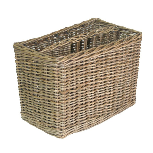 Empty antique wicker magazine rack with curved handles, shown on plain white background in rustic countryside style.