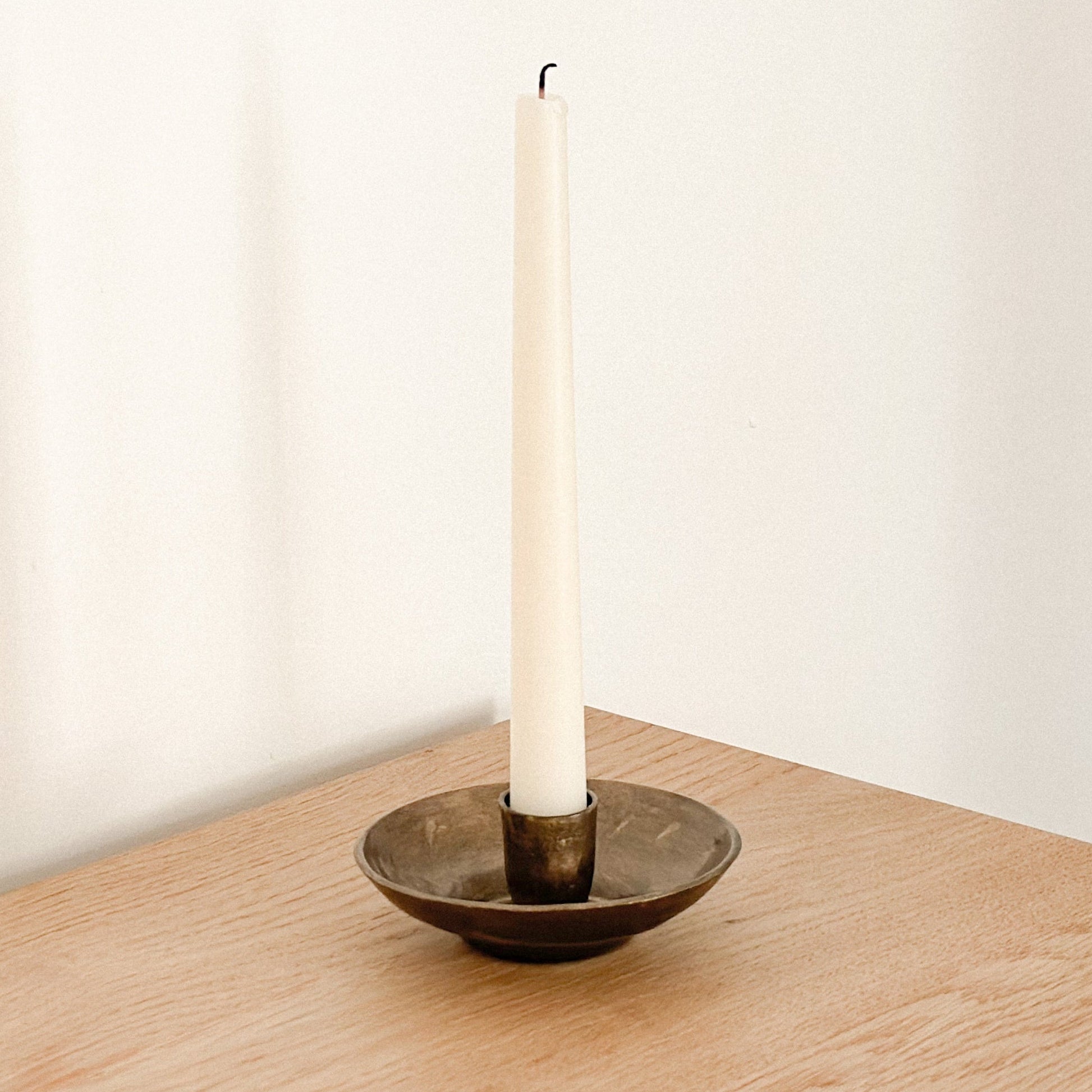 Brambourne candle holder in rustic iron with antique gold finish, low-profile design for mantel or table styling