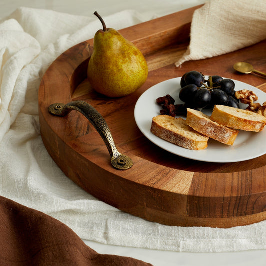 The Branlow Hearth Tray styled with light breakfast—fir wood oval tray with brass handles, layered with pastries, linen, and countryside morning charm