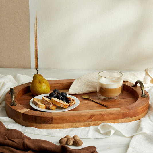 The Branlow Hearth Tray in warm fir wood with antique brass handles, oval rustic serving tray styled for winter gatherings and heritage home decor