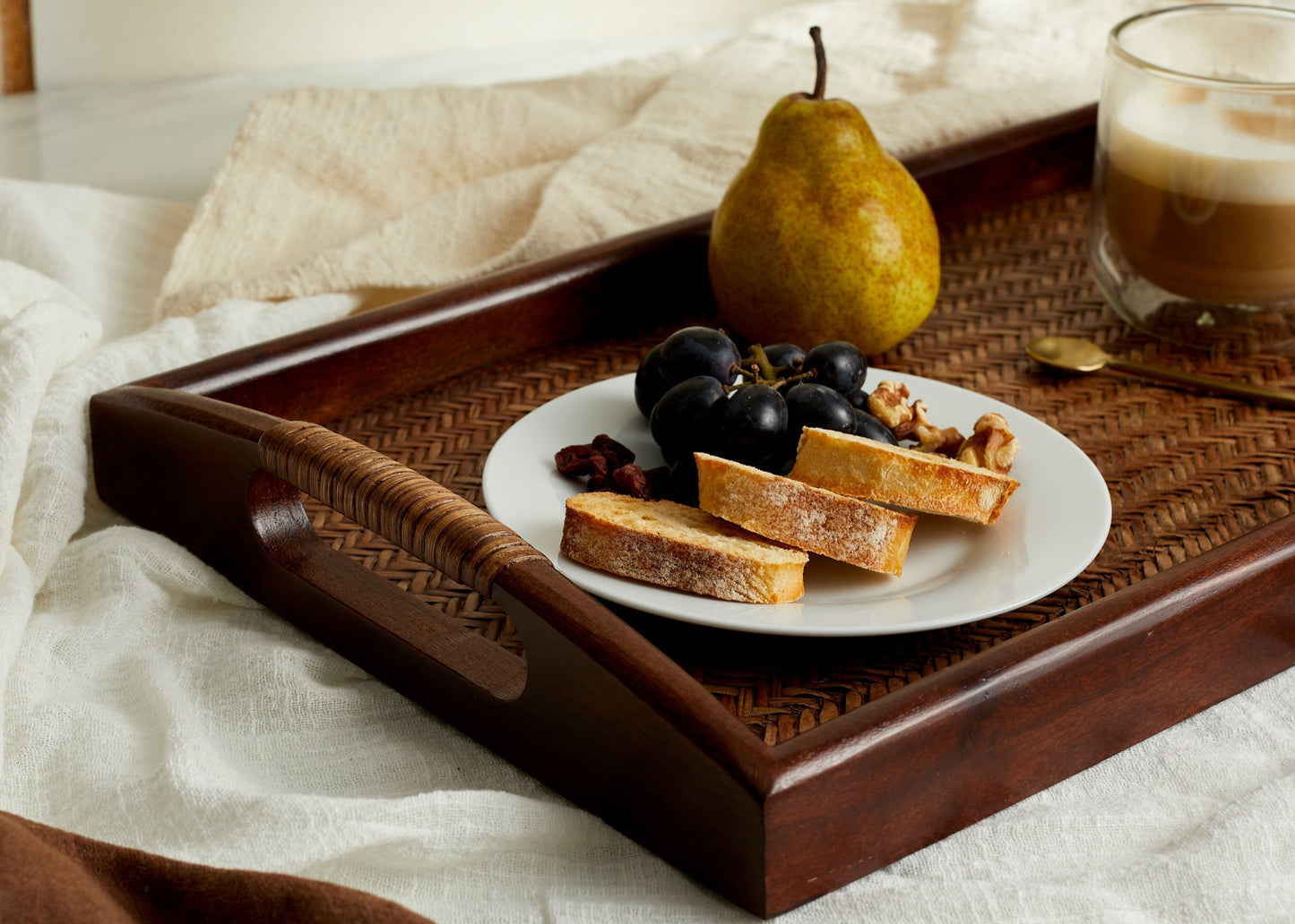 Branscombe Rattan Tray – close-up of natural rattan weave and acacia wood frame, styled with breakfast for soulful mornings and timeless hosting