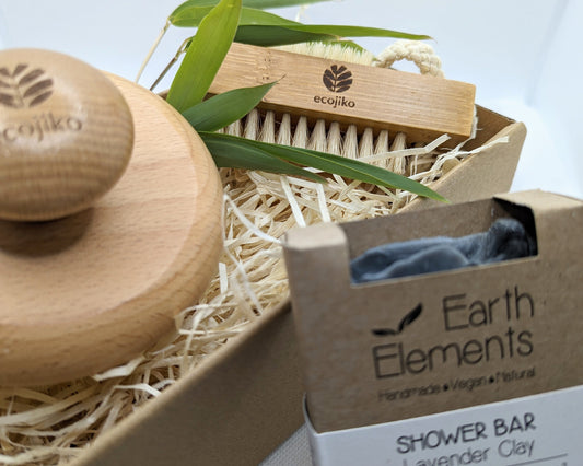 Vegan soap and wooden brush eco gift set in kraft box with natural textures and countryside-inspired packaging