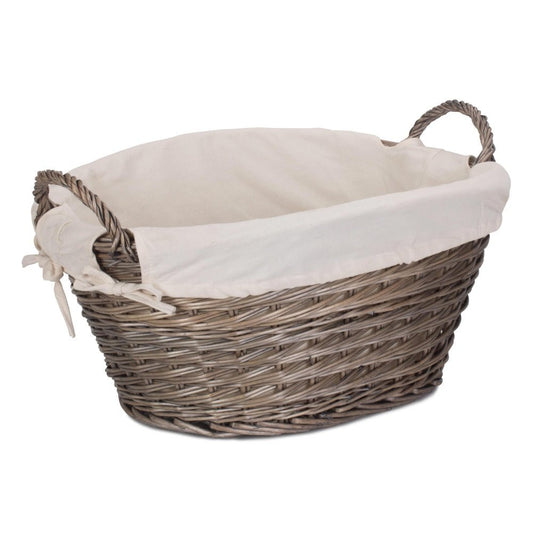Full view of The Elmsmere Basket – small handwoven wicker laundry carrier with soft white lining, crafted for countryside homes and gentle linen rituals