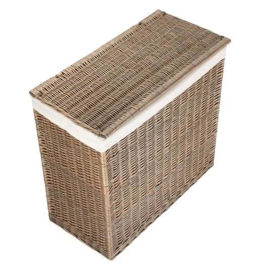Side profile of large rectangular wicker laundry basket in rust beige, showing handwoven texture and partitioned interior from The Elmsmere collection