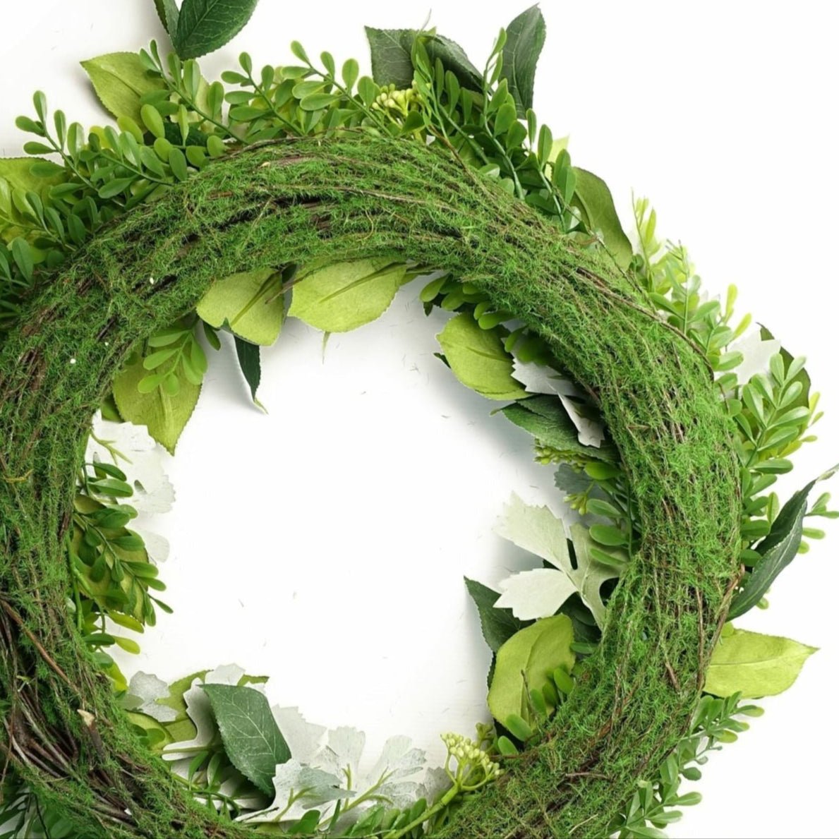 Close-up of the back of The Fern & Fable Wreath—showing natural woven base with secure binding and lightweight structure, crafted for easy hanging and rustic charm.