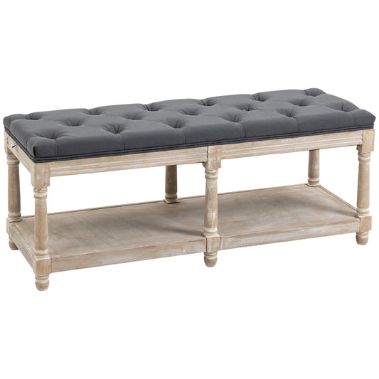 Front view of grey linen bench with button-tufted seat and open base, part of The Haddon Hall Still collection by The Timeless Trading Co.