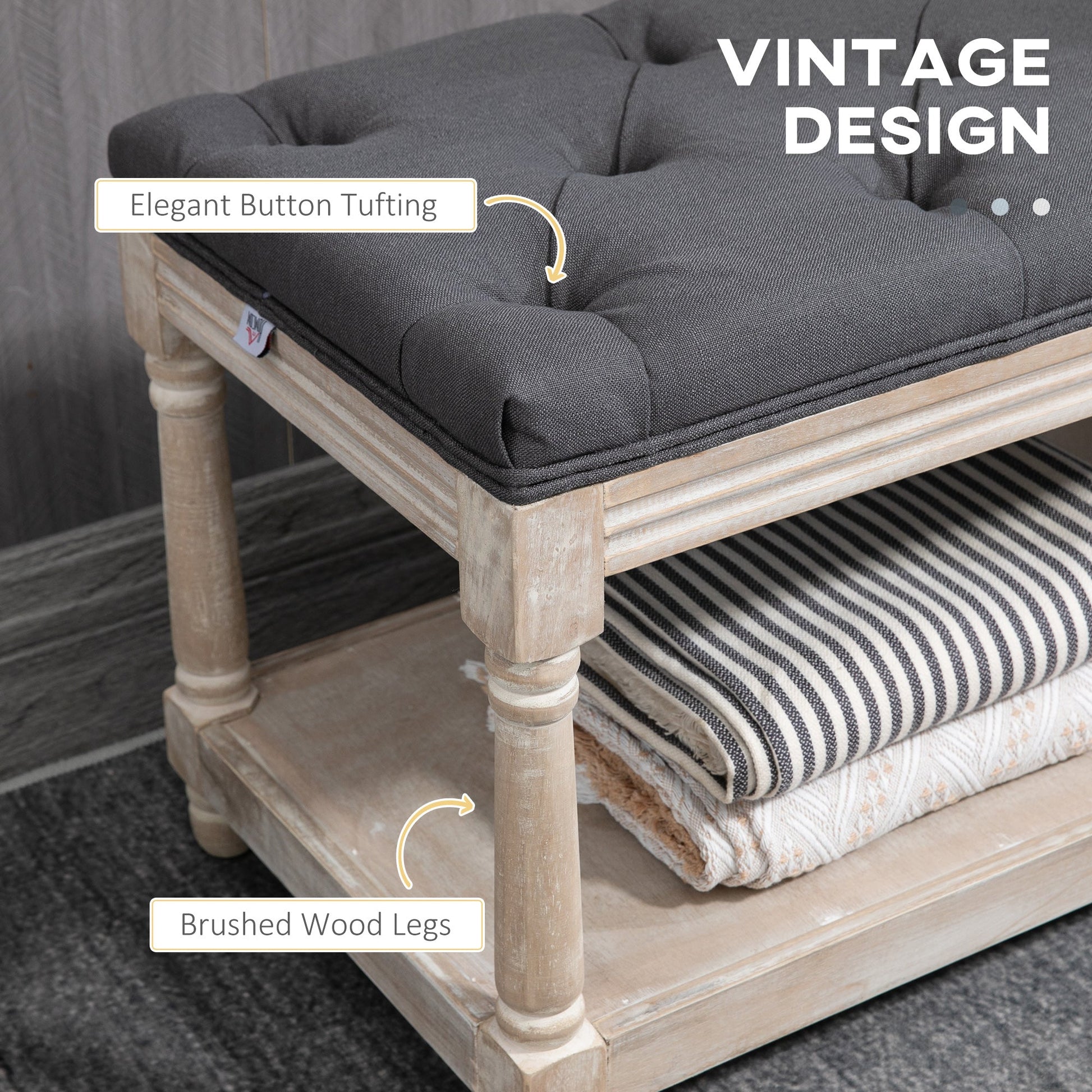 Cream linen bench with button-tufted seat and single shelf styled with folded throws, part of The Haddon Hall Welcome collection by The Timeless Trading Co.