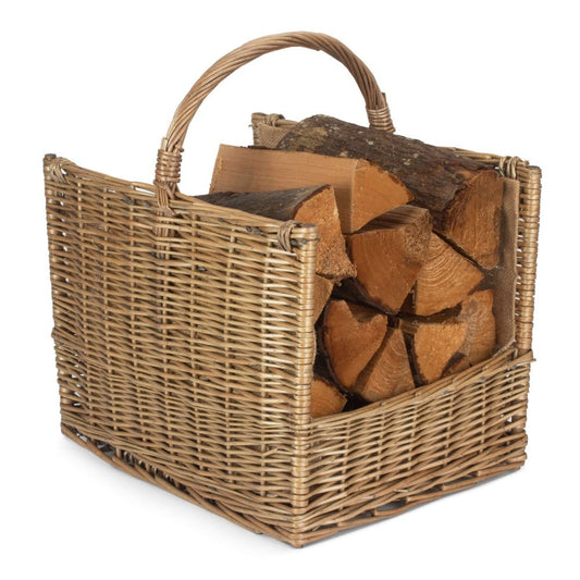 Handwoven antique wash wicker log basket filled with split firewood