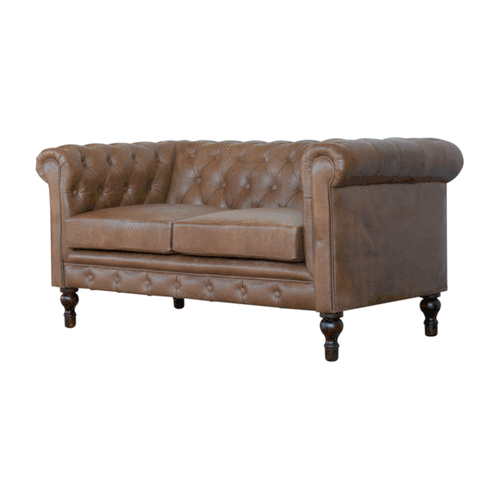 The Hearthmere Chesterfield two-seater sofa in buffalo leather with deep button tufting and solid wood legs, style is timeless
