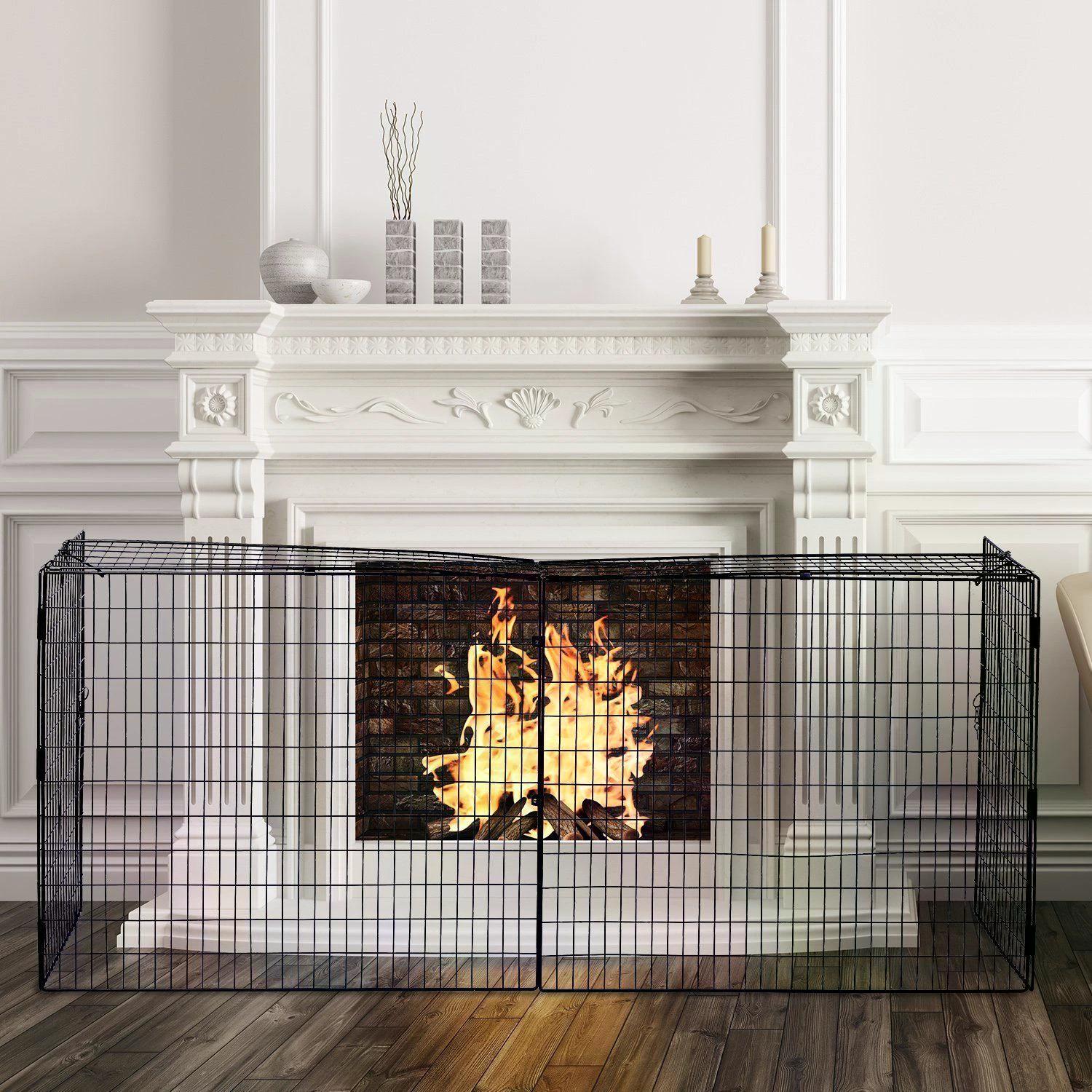 Hearthwarden Fireguard in matte black mesh steel positioned in front of fireplace; extendable screen with folding panels and heritage styling.
