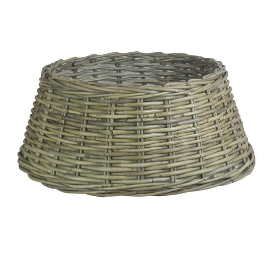 Large grey kubu rattan Christmas tree skirt with rustic woven texture and tapered silhouette.