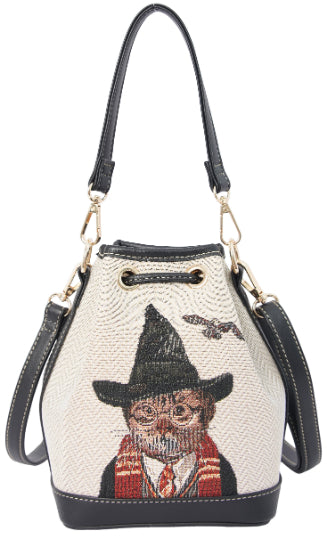 Magical cat tapestry bucket bag with vegan leather trim displayed on plain blank background