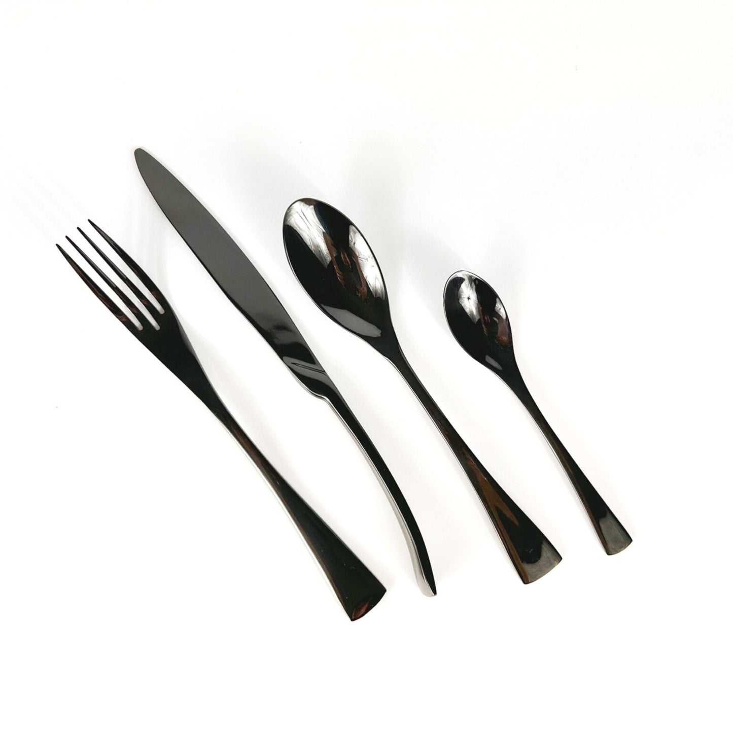 Ravenswell matte black stainless steel cutlery set isolated on blank background—minimalist styling with rustic elegance and timeless utility.