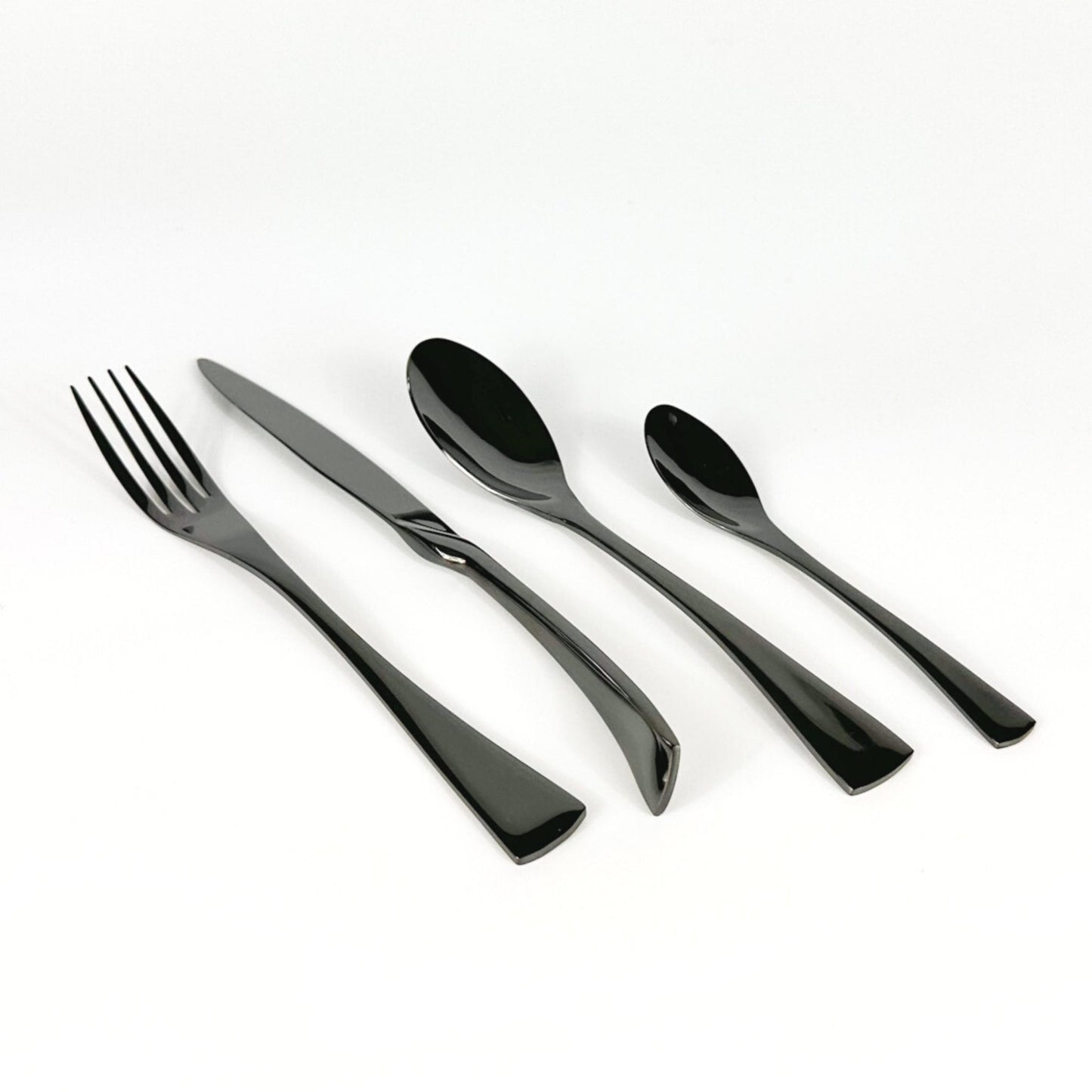 Ravenswell matte black stainless steel cutlery set isolated on blank background—minimalist styling with rustic elegance and timeless utility.