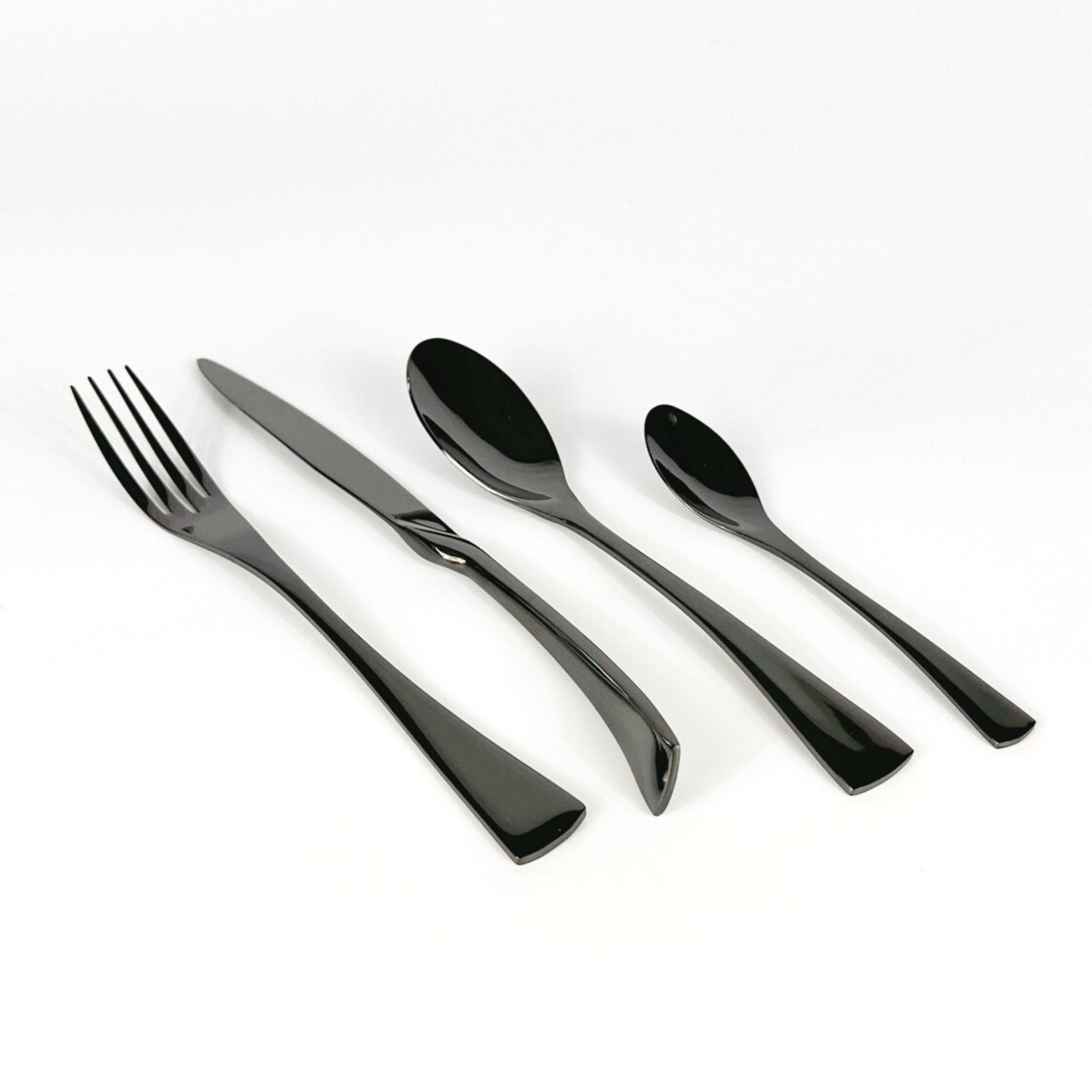 Ravenswell matte black stainless steel cutlery set isolated on blank background—minimalist styling with rustic elegance and timeless utility.