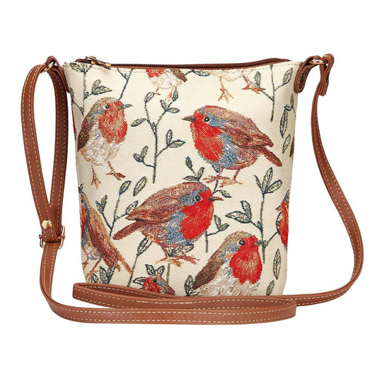 Robin sling bag in tapestry fabric with zip closure, adjustable strap and vegan leather trim in warm woodland tones