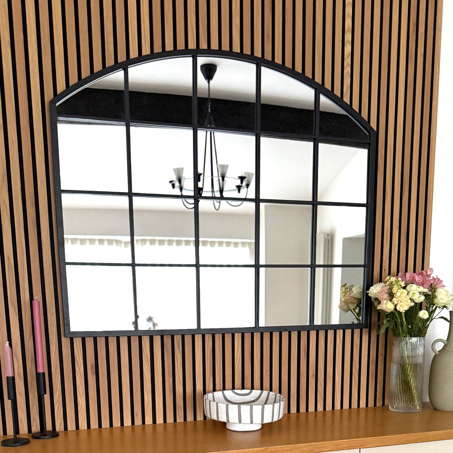 Black arched lattice mirror in hallway — 95cm x 120cm frame styled to reflect light and add timeless dockside charm to entrance spaces