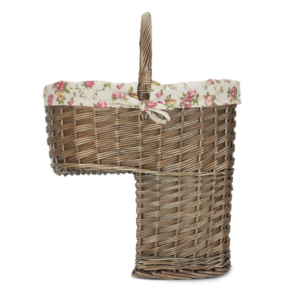 Side view of antique wash willow stair basket with curved handle and antique rose lining — elegant organiser for hallway or bootroom