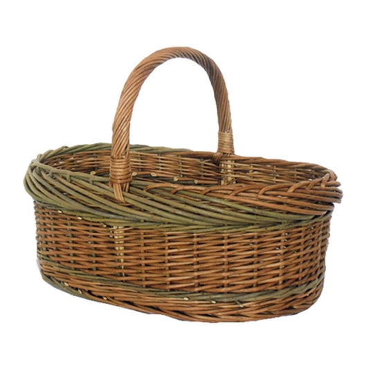 Green willow wicker shopping basket with curved handles — styled for countryside errands and hallway charm