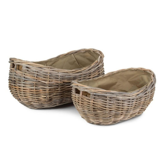 Boat-shaped rattan log basket with Cordura lining — handwoven fireside storage inspired by coastal cottages and countryside hearths
