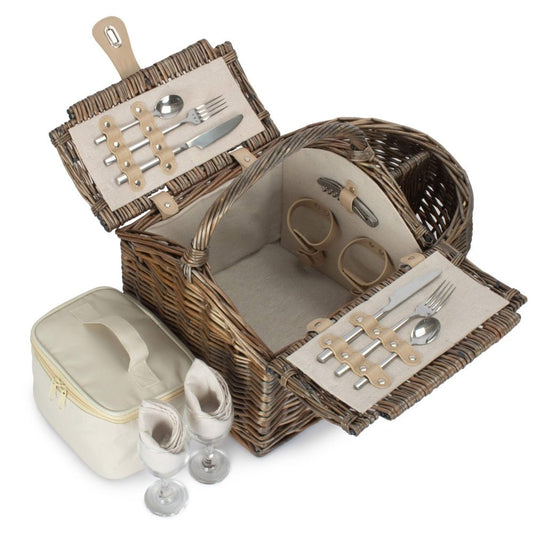 Boat-shaped wicker picnic basket with fitted interior — handwoven hamper styled for countryside walks, dockside lunches, and timeless outdoor rituals