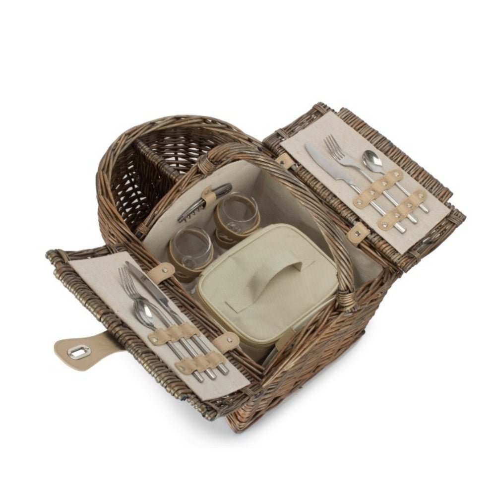 Boat-shaped wicker picnic basket with fitted interior — styled for meadow walks, harbour lunches, and timeless countryside gatherings