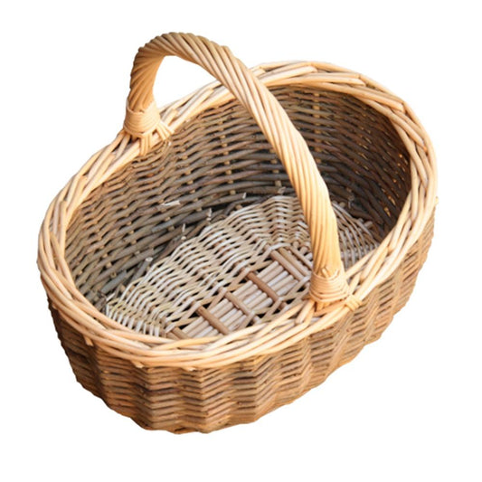 Mini wicker shopping basket in meadow green — hand-woven with curved handles, styled for market strolls and hallway charm