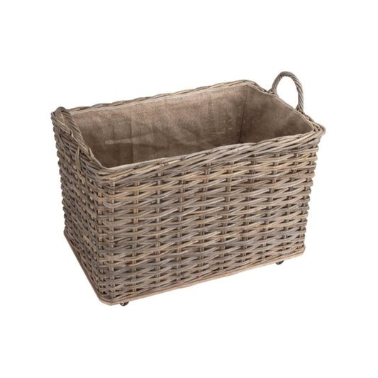 Top-down view of The Wainsford Log Keeper showing deep antique wash rattan frame and soft hessian lining – wheeled fireside basket for storing winter logs with timeless charm