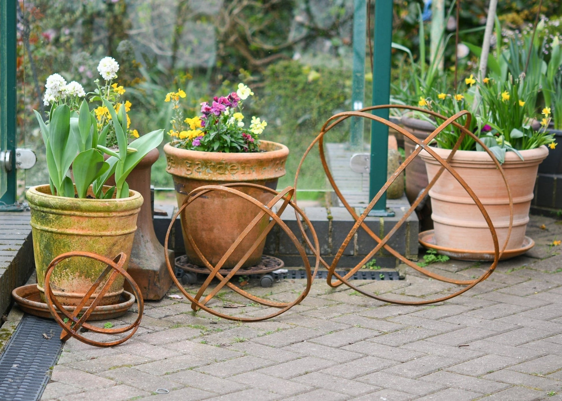 Whispering Garden Sphere Trio – Rusted Steel Sculptures - The Timeless Trading Co.