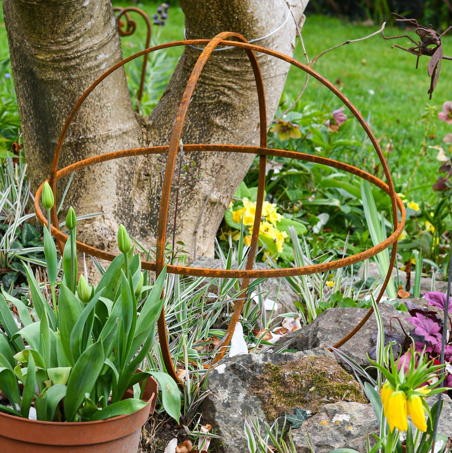 Whispering Garden Sphere Trio – Rusted Steel Sculptures - The Timeless Trading Co.