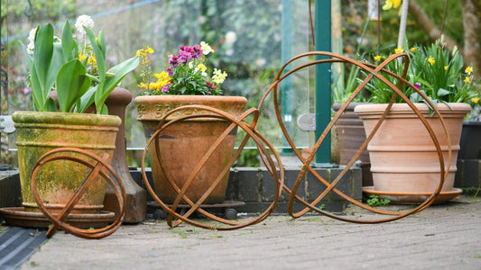 Whispering Garden Sphere Trio – Rusted Steel Sculptures - The Timeless Trading Co.