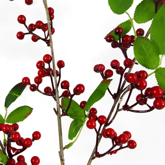 Close-up of The Winthrop Gathering redberry stem, 80cm festive spray with rustic foliage, heritage-style texture in warm seasonal tones