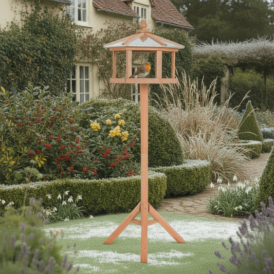 Wooden bird feeder stand in frosty country garden, natural fir table inviting birds to feed and rest in winter’s quiet beauty