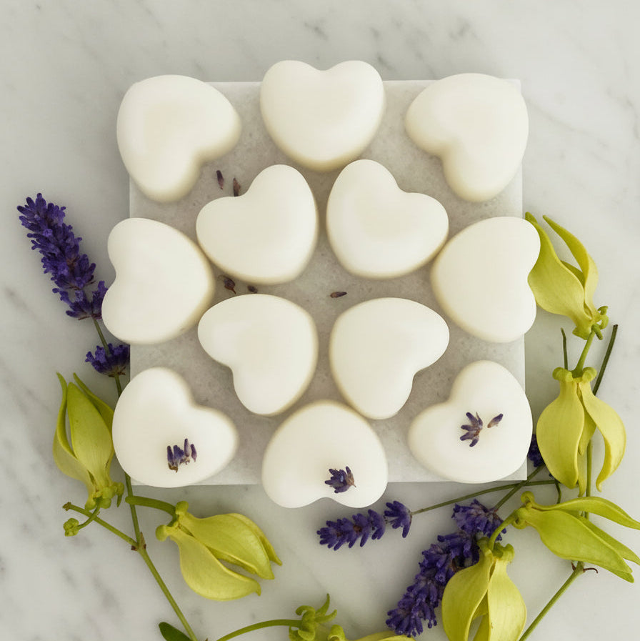 Twelve lavender ylang ylang wax melts displayed on a table for Christmas aromatherapy gift
