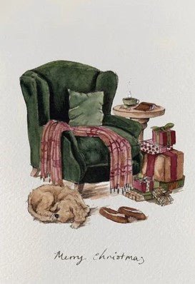 Cozy Christmas scene with a green armchair, plaid blanket, small table with a cup, and wrapped gifts on a white background.