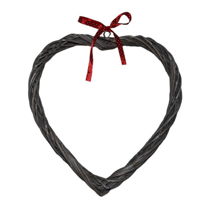 Elspeth Wreath – wicker heart with red spotty ribbon, styled for vintage charm and soulful decoration.