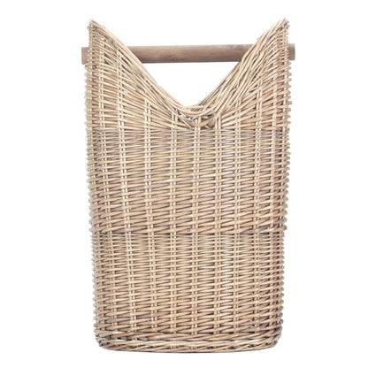 The Aldwych Loo Stand – round handwoven wicker toilet roll holder with antique wash finish, shown empty from the side to highlight its curved silhouette, spacious interior, and natural weave.