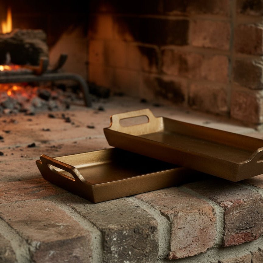 Alderley Gold Tray – brushed gold aluminium, styled on hearth with candlelight and rustic accents for timeless fireside hosting and soulful decor