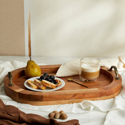 The Branlow Hearth Tray in warm fir wood with antique brass handles, oval rustic serving tray styled for winter gatherings and heritage home decor