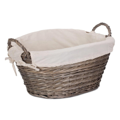 Full view of The Elmsmere Basket – small handwoven wicker laundry carrier with soft white lining, crafted for countryside homes and gentle linen rituals