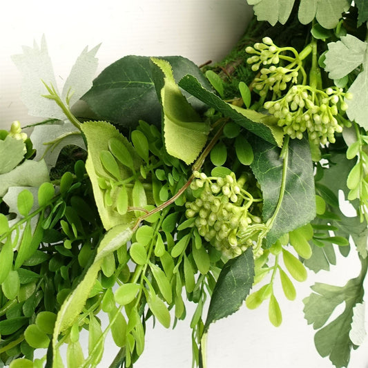 Close-up of The Fern & Fable Wreath—50cm artificial fern foliage in layered green tones with natural woven base, showing botanical texture and vintage styling.