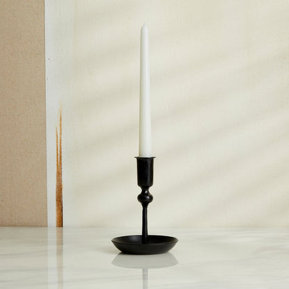 Hand-forged iron candle holder in matte black finish, rustic forge-style decor for winter mantle or festive table setting
